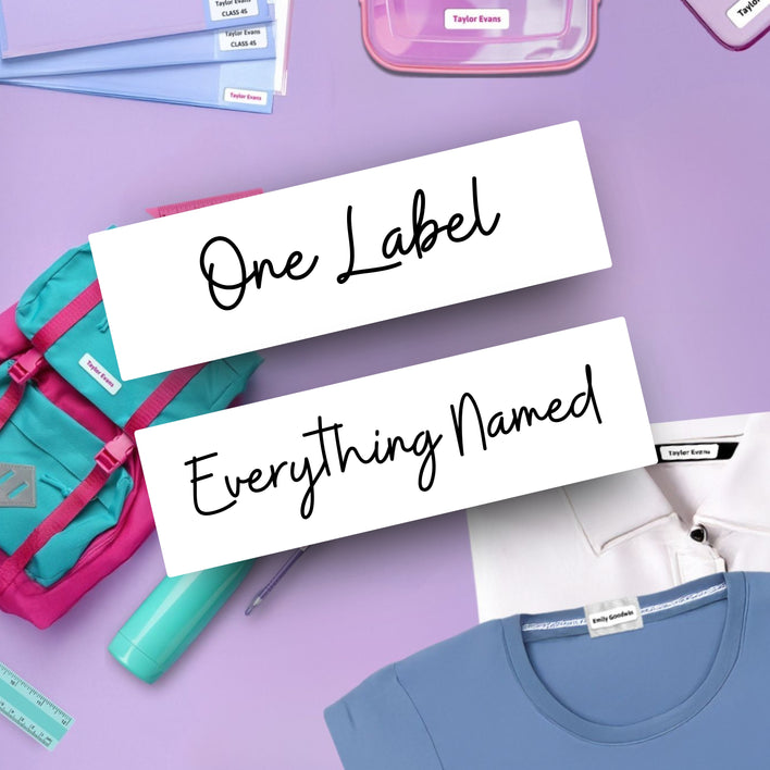 Two white rectangular personalised name labels with black script text reading 'One Label' and 'Everything Named' are arranged on a lavender background with school supplies and clothing around them.